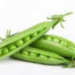 Fresh green pea pod and peas on white background